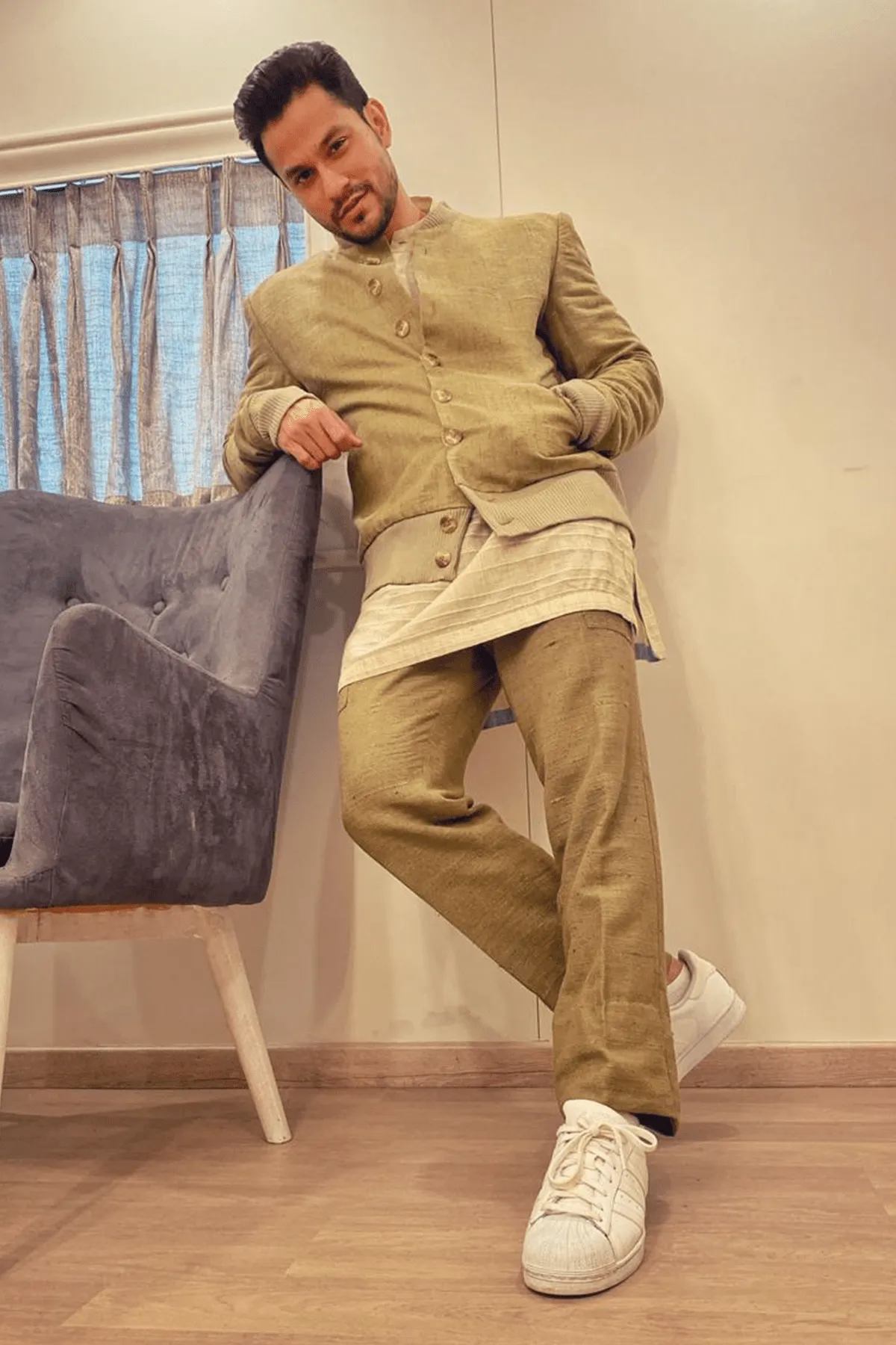 Kunal Khemu In Olive green bomber jacket with off white kurta and olive green trousers