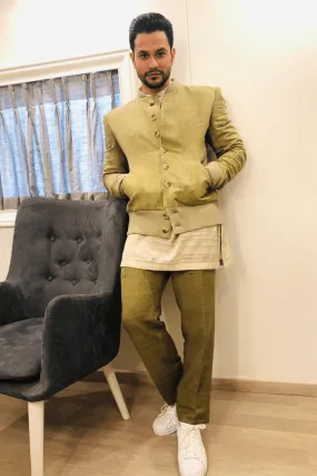 Kunal Khemu In Olive green bomber jacket with off white kurta and olive green trousers