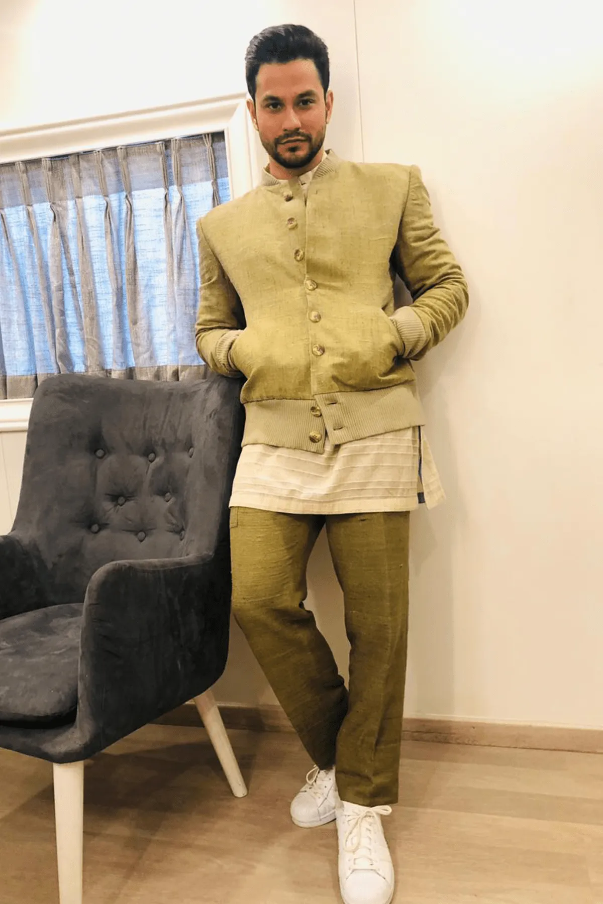 Kunal Khemu In Olive green bomber jacket with off white kurta and olive green trousers