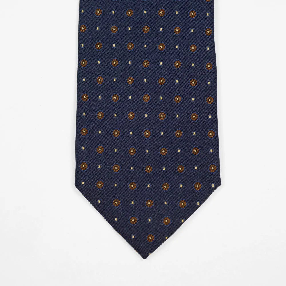 Navy silk twill tie, copper & blue rosette neat print
