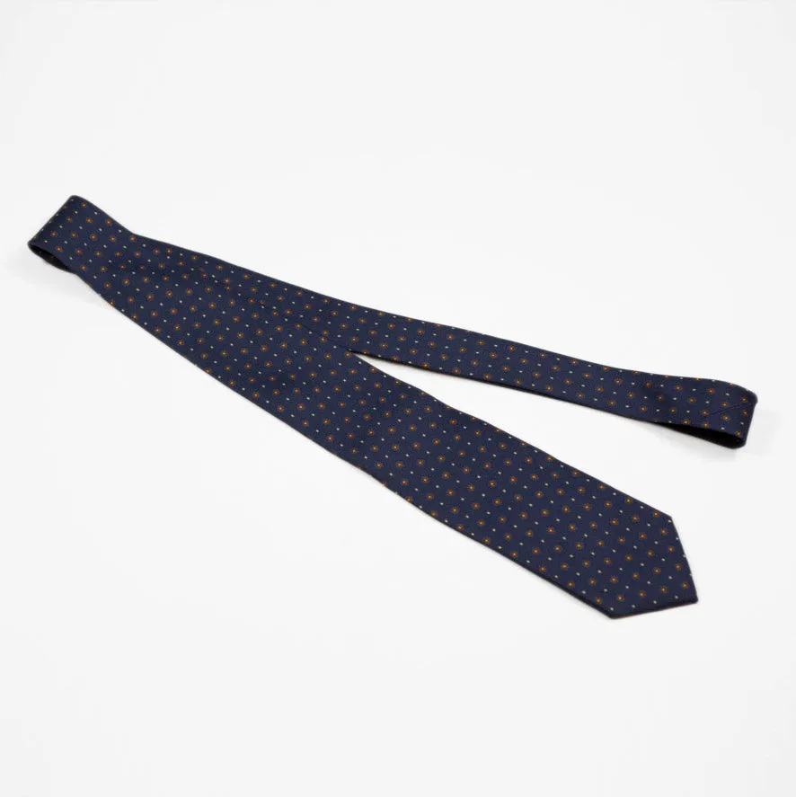Navy silk twill tie, copper & blue rosette neat print