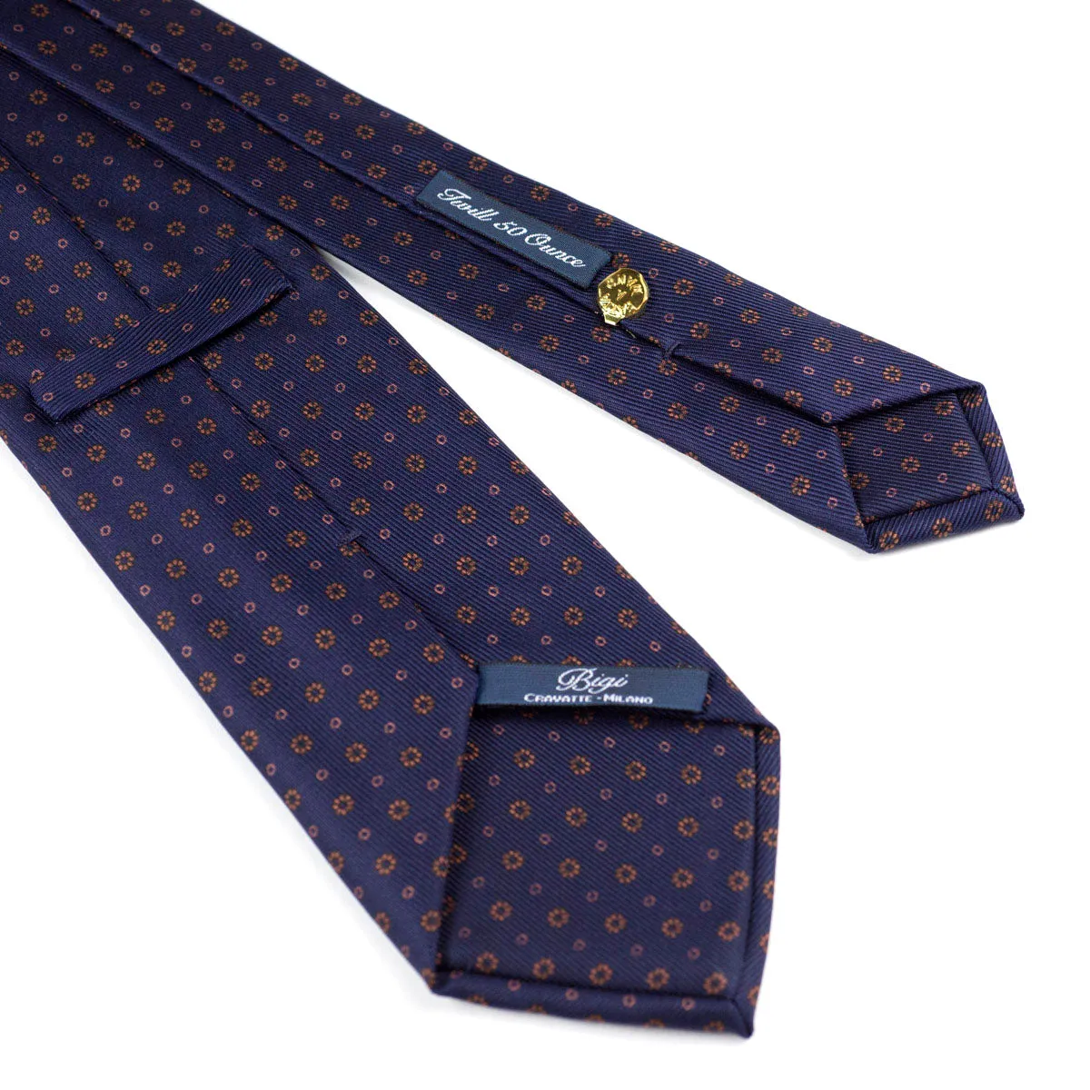 Self-tipped navy repp silk tie, copper neat prints