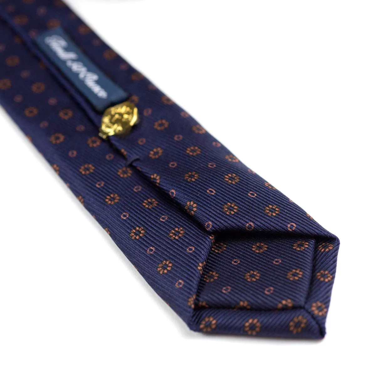 Self-tipped navy repp silk tie, copper neat prints